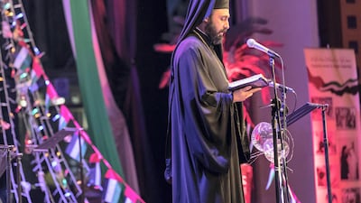 Bishop Gregorios of the Orthodox church leads a prayer as churches of different denominations came together under one roof the first time in the UAE to mark National Day. Antonie Robertson / The National