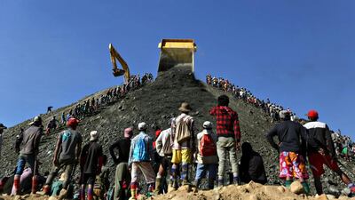 Miners search for jade stones at a mine dump at a Hpakant jade mine in Kachin state, Myanmar. Soe Zeya Tun / Reuters