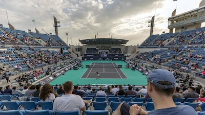 Fans watch the match between Stefanos Tsitsipas and Andrey Rublev at the Mubadala World Tennis Championship. Chris Whiteoak / The National