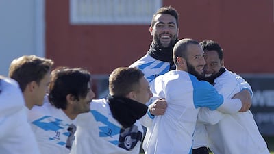 Sevilla’s Iborra, centre, and his teammates have had plenty of reasons to smile during their Europa League campaign as they need just a draw on Thursday night against Rijeka to advance. Paco Puentes / EPA