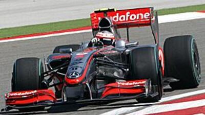 McLaren's Heikki Kovalainen of Finland takes a curve during the first practice session in Istanbul.