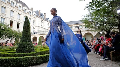 Zuhair Murad delivers unabashed opulence while returning to the runway after the fashion world's hiatus during the pandemic. Getty