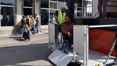 Airport workers push sick Yemenis in wheelchairs before boarding a UN medical evacuation plane at Sana'a airport, Yemen. EPA