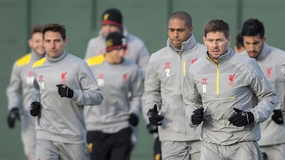 Captain Steven Gerrard, right, got a injury-time penalty opportunity to save Liverpool from embarrassment when they last met Ludogorets in the away game in September. Peter Powell / EPA