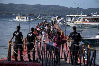 Tourists arrive at Boracay on October 26, 2018 after the Philippines re-opened the resort island to holidaymakers. AFP