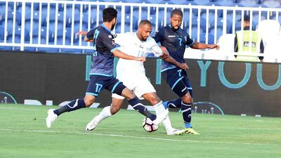 Baniyas, in white and light blue, fought back to earn a draw against Dibba on Saturday night. Courtesy: Arabian Gulf League