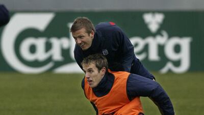 England's David Beckham with Phil Neville in 2005. PA
