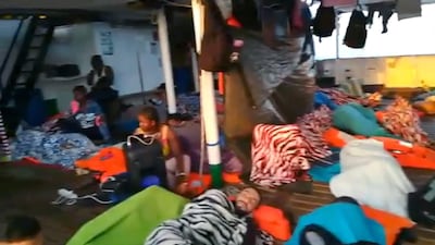 Migrants on board the Open Arms ship in Lampedusa island. EPA