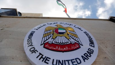 The flag of the UAE flutters atop the embassy building during the inauguration ceremony of the reopening of the embassy in Damascus, Syria. EPA