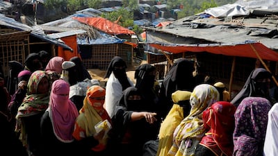 Rohingya refugee women queue for aid at Kutupalong refugee camp, near Cox's Bazar in Bangladesh, on January 4, 2018. Tyrone Siu / Reuters