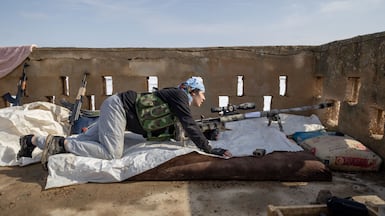 A YPG fighter takes position at the frontline near Hasakah, Syria. Getty Images