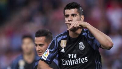 Real Madrid's Alvaro Morata celebrates scoring his second goal against Granada on Saturday May 6, 2017. Daniel Tejedor / AP Photo