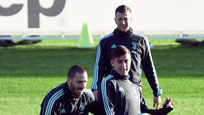 Juventus' Paulo Dybala and Leonardo Bonucci during training. Reuters