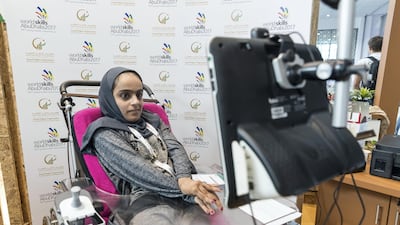 Huda Al Kaabi has Cerebral Palsy and uses a computer program to control elements of her environment with her eyes. Antonie Robertson/The National