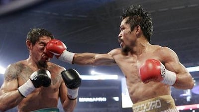 Manny Pacquiao on his way to a win by decision.
