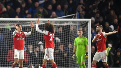 Hector Bellerin and Matteo Guendouzi of Arsenal high five after the final whistle. Getty