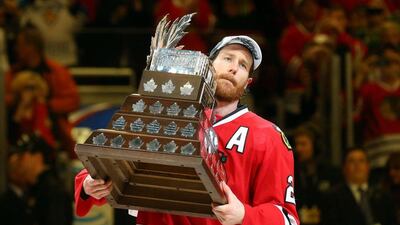 Duncan Keith celebrates with the Conn Smythe trophy after defeating the Tampa Bay Lightning in Game Six to win the 2015 NHL Stanley Cup Final at the United Center on June 15, 2015 in Chicago, Illinois. Bruce Bennett / Getty Images