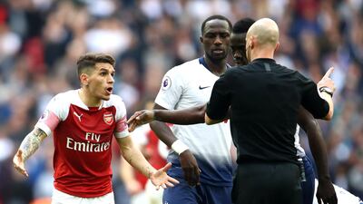 Lucas Torreira of Arsenal reacts after being shown a red card by referee Anthony Taylor. Getty Images