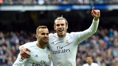 Gareth Bale, right, marked his injury return by scoring off the bench for Real Madrid in the 7-1 win against Celta Vigo. Gerard Julien / AFP
