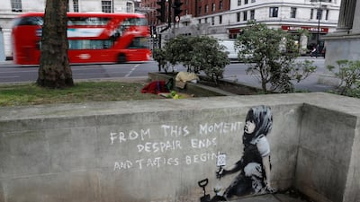A graffiti believed to have been created by street artist Banksy is seen at Marble Arch. Reuters