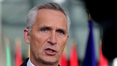 Nato Secretary General Jens Stoltenberg speaks with reporters as he arrives for a meeting of defence ministers in Brussels. AP