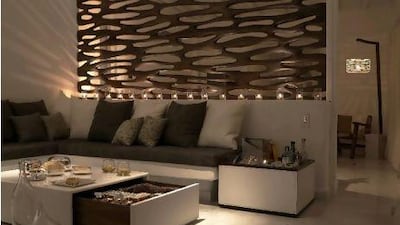 David Rockwell is a fan of multipurpose elements, such as his coffee table that has hidden storage.