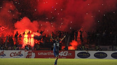 Indonesian football team Persib Bandung players and staff celebrate after winning the President tournament championship in Jakarta. Azwar via Getty Images
