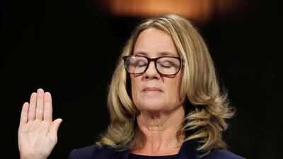 Christine Blasey Ford closes her eyes as she is sworn in before testifying to the Senate Judiciary Committee confirmation hearing for President Donald Trump's Supreme Court nominee Judge Brett Kavanaugh on Capitol Hill on September 27, 2018. Reuters