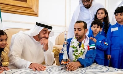 Maj Hazza Al Mansouri with Sheikh Mohamed bin Zayed. Courtesy: Dubai Media Office