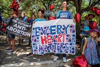 Pro-life protesters stand near the gate of the Texas state capitol in Austin in May. AFP