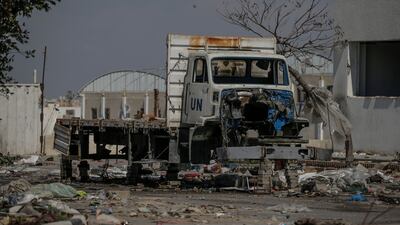 A destroyed UN aid lorry sits among rubble in Khan Younis after Israeli troops pulled out of the area. EPA