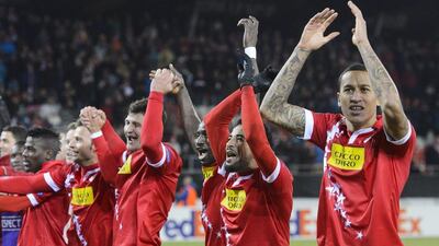 epa05064193 Sion's soccer players celebrates the qualification, during the UEFA Europa League group B soccer match between FC Sion and FC Liverpool at the Tourbillon stadium in Sion, Switzerland, 10 December 2015. EPA/JEAN-CHRISTOPHE BOTT