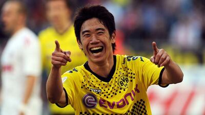 Shinji Kagawa playing for Borussia Dortmund in 2012. AFP