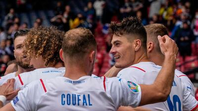 Czech Republic's Patrik Schick, right, is congratulated by teammates after scoring his second goal. AP