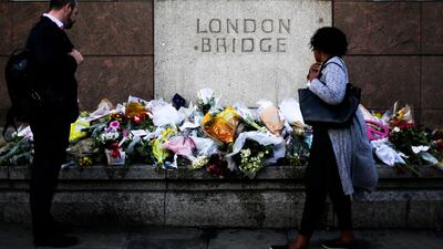 Floral tributes placed at London Bridge to commemorate the victims of the terror attack in London. The inquest criticised the lack of barriers to protect pedestrians on London Bridge. AP Photo