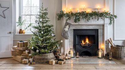 Spare-paper-wrapped gifts, LED fairy lights and cloth or wooden ornaments are some ways to have an eco-friendly Christmas. Photo: Garden Trading