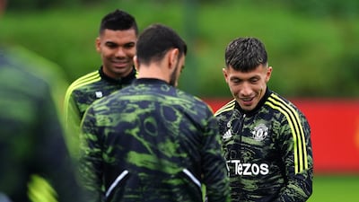 Lisandro Martinez with team-mates at the Aon Training Complex. PA