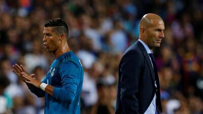 Cristiano Ronaldo, left, has been given a five match ban and manager Zinedine Zidane, right, is not pleased. Juan Medina / Reuters