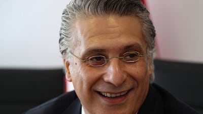 Nabil Karoui, the imprisoned Tunisian media magnate and presidential candidate is pictured after submitting his candidacy to Tunisia's electoral commission in the capital Tunis on August 2, 2019. AFP / Hasna