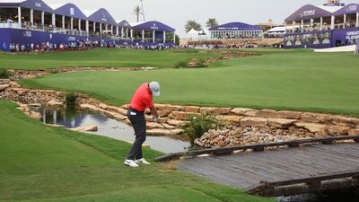 Rory McIlroy of Northern Ireland plays his third shot on the 18th hole during Day One of the DP World Tour Championship on the Earth Course at Jumeirah Golf Estates on November 16, 2023 in Dubai, United Arab Emirates. (Photo by Andrew Redington / Getty Images)