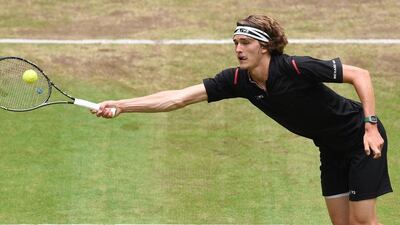 Alexander Zverev of Germany returns the ball to Roger Federer during their semi-final match at the Halle ATP tournament on Saturday. Carmen Jaspersen / AFP / June 18, 2016
