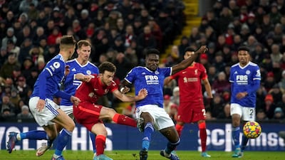 Diogo Jota scores his and Liverpool's second goal. PA