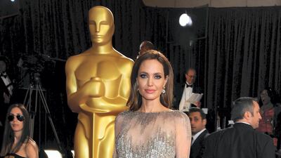 2014: Angelina Jolie wears Elie Saab to the 86th Academy Awards on March 2nd, 2014 in Hollywood, California. AFP