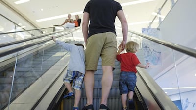 Men provide both physical and psychological support to their children. Sarah Dea/The National