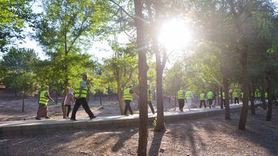Participants walk through King Hussein Park.