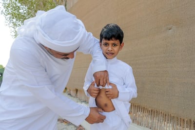 Abdulrahman Atiq, seven, from Abu Dhabi, also swallowed two of the magnets last week. Victor Besa / The National