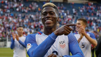 Gyasi Zardes #9 of the United States gestures as he walks off the pitch after defeating Ecuador 2-1 in the 2016 Quarterfinal - Copa America Centenario match at CenturyLink Field on June 16, 2016 in Seattle, Washington. Otto Greule Jr/Getty Images/AFP
