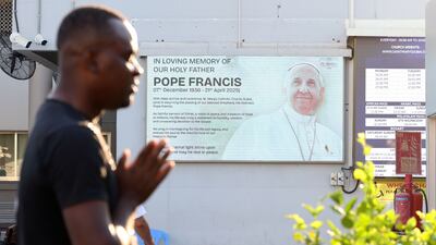 People pray at St Mary's Church in Dubai. Chris Whiteoak / The National