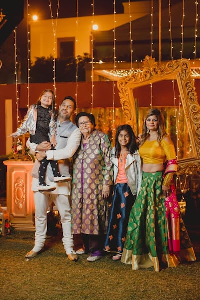 File photo of Deepak Malhotra with his family - mother Neetu, wife Malika and daughters Saanvi, 11, and Mahi, 6. Deepak Malhotra