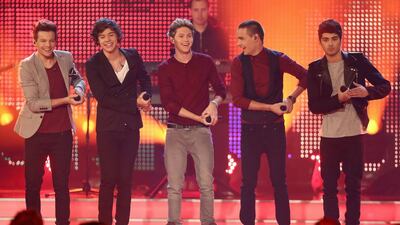 The boys pick up steam as they make it in the US. The following singles Gotta Be You and One Thing also peak on the UK Singles Chart Top 10. After signing a deal with Columbia Records in the US, What Makes You Beautiful tops the Billboard Hot 100 in 2012 and their first US studio album, Up All Night, gets a global release.